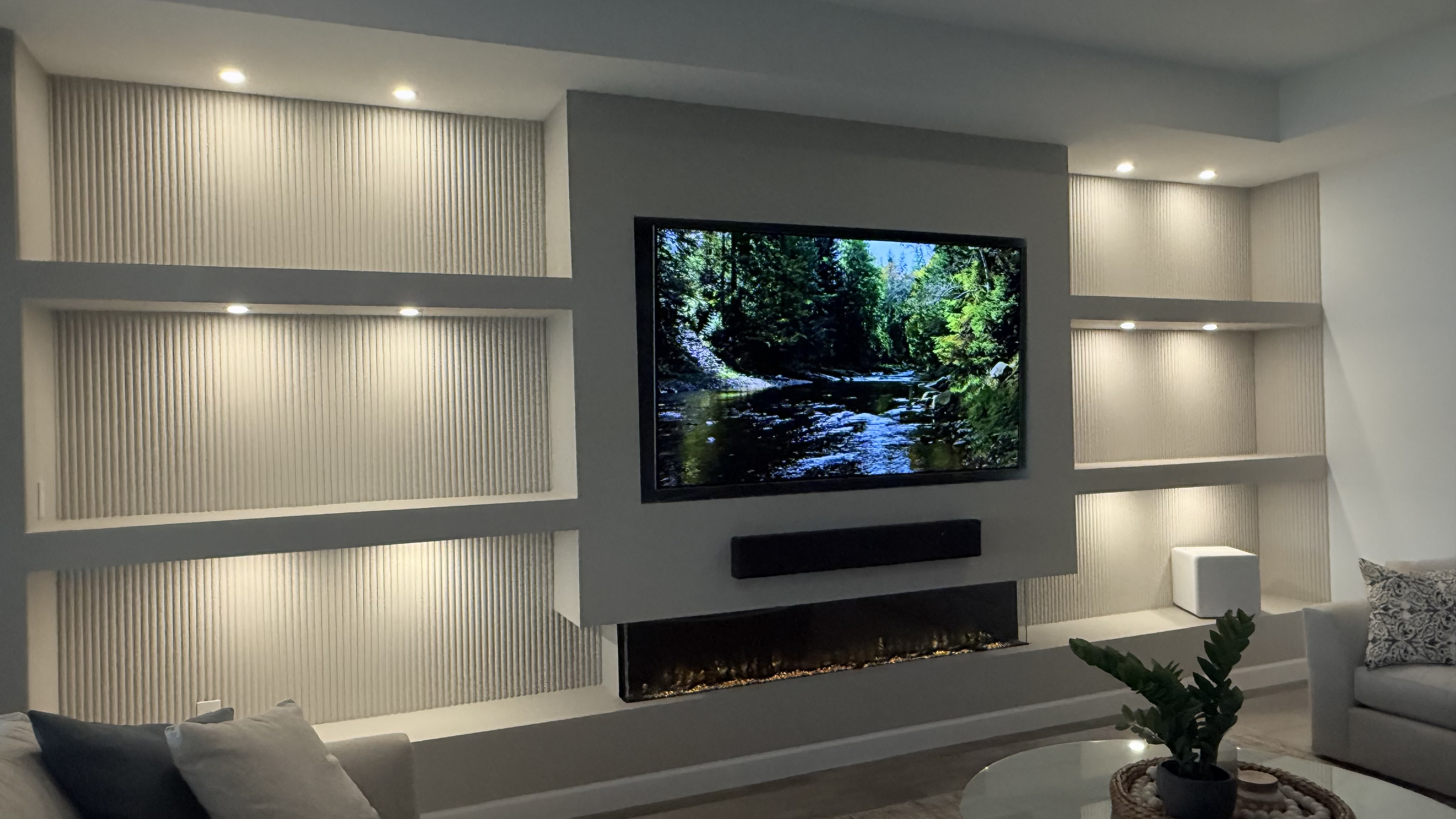 Luxury entertainment wall with coffered ceiling and shiplap